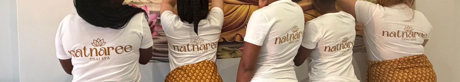Natnaree branded t-shirts worn by the Thai-trained therapy team